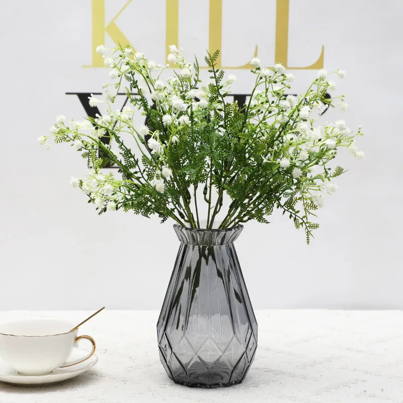 décoration intérieure bouquet artificiel feuilles vertes fleurs blanches jaunes roses naturel salon jardin