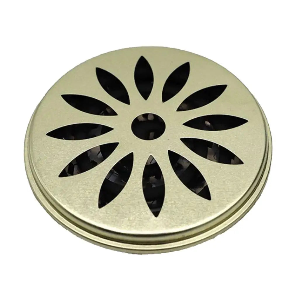 support bobine moustique argenté moderne perforé motifs floraux deco camping maison