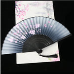 éventail pliant fleurs cerisier papillons art japonais traditionnel tassel couleur bleu rose