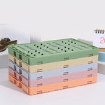 caisse rangement pliable plastique orange vert beige gris rose grille perforations moderne pratique