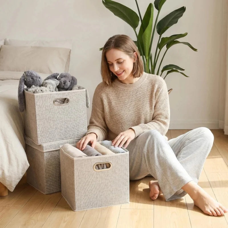 boîtes rangement pliables tissu lin beige poignées métalliques moderne organisation chambre enfants jouets