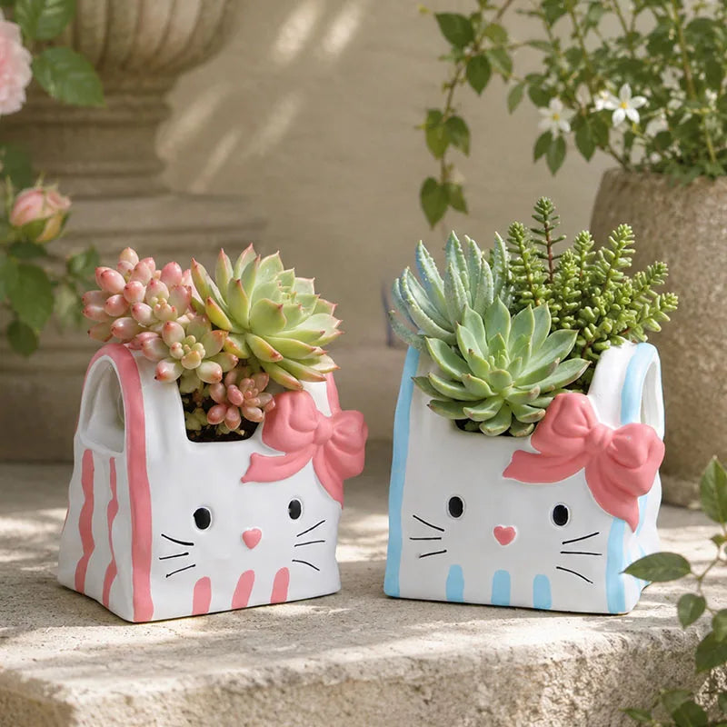 cache pot résine forme chat blanc bleu rose yeux noirs narines roses sourcils noirs