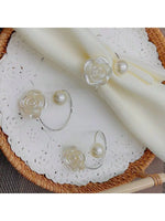 anneaux serviette or roses argent élégants classiques mariage décoration table festive