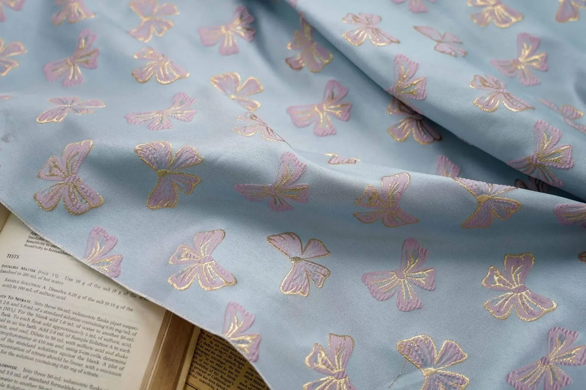 tissu polyester rose clair papillons doré noir moderne élégant coudre bricolage respectueux environnement Jacquard