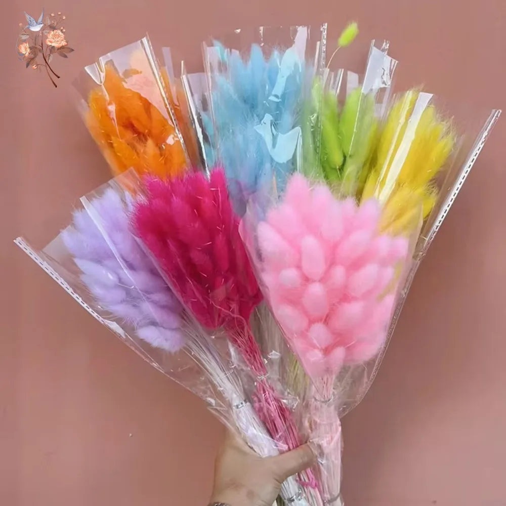 décoration intérieure bouquet fleurs sèches plumes modernes rose blanc vert pastel