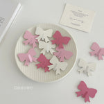 clips décoratifs nœuds blanc rose clair rose foncé modernes brillants sans perçage