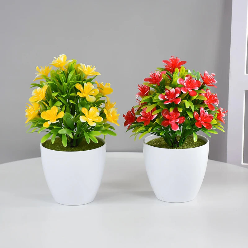 plantes artificielles fleurs rouges jaunes violettes blanches feuilles vertes pot blanc moderne décoration intérieure