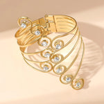 bracelet élégant or argent strass spirales fermoir vintage métal moderne