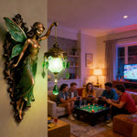 lampe murale mythologique sculptée personnages feuilles verre translucide bronze verte decorative fantastique