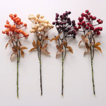 décoration intérieure bouquet artificiel feuilles baies rouge orange naturel rustique