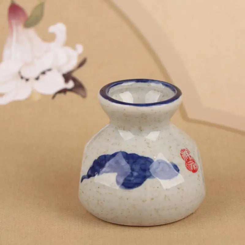 vases céramique artisanal poissons fleurs blanc bleu rouge vert
