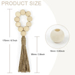 Guirlande ronde en perles de bois beiges avec un gland en fibre de jute, mesurant 170 mm de hauteur et 95 mm de diamètre, idéale pour décorer l'intérieur ou l'extérieur.