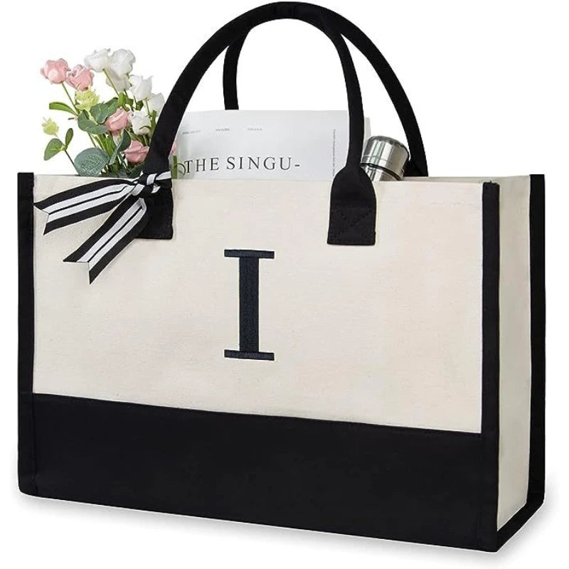 sac main toile lettre imprimée blanc noir rubans classique poignées intérieur noir zippé capacitaire