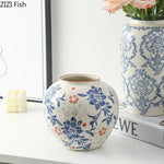 vase classique porcelaine fleurs blanc rouge bleu vert marron decoration table floral