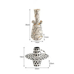 vase céramique moderne blanc noir orange motifs abstraits points bibliothèque décoration