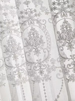 rideaux blancs motifs floraux brodés translucides élégant texture douce