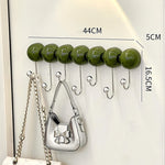 porte sacs mural moderne adhésif sans perçage crochets rouge vert olive sphères brillantes
