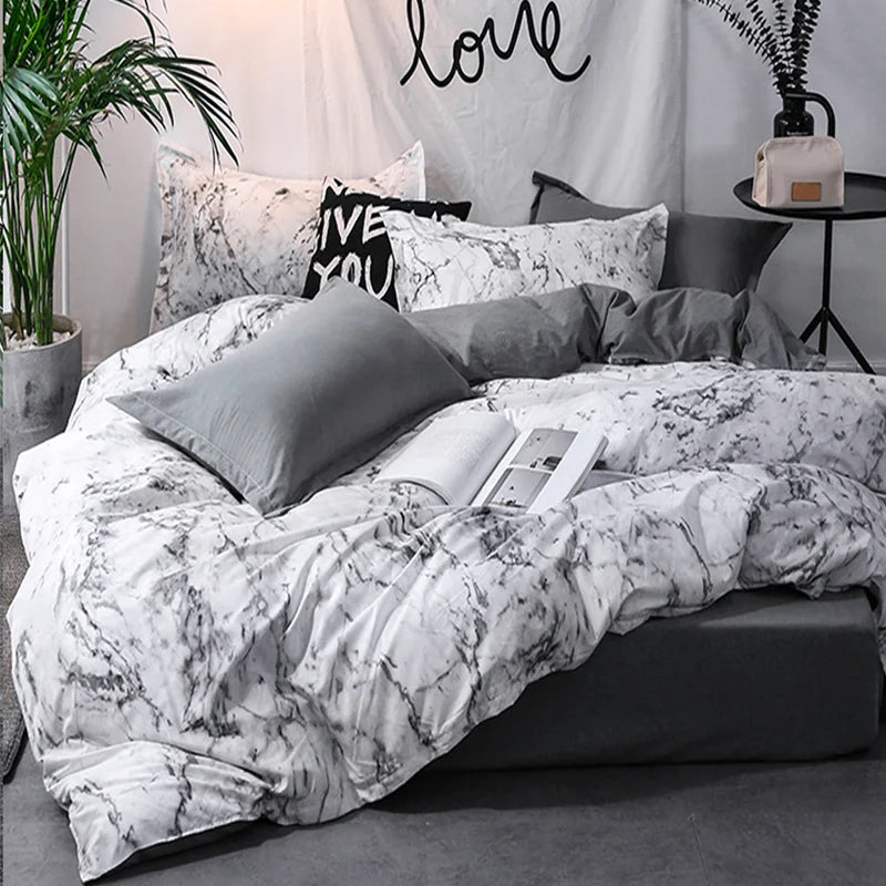 ensemble literie moderne motif marbré abstrait noir blanc pièces duvet taies d'oreiller