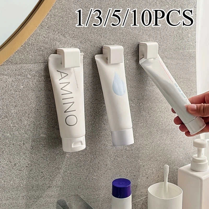 organisateur mural blanc minimaliste tubes crème adhésif logo gouttes d'eau opaque porte dentifrice support