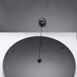 suspension lumineuse moderne plaque noire bras métalliques boules câbles fixations