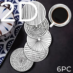coasters bois blanc rayures noires spirales modernes décoration intérieure 14+
