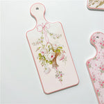 planche découper céramique vintage fleurs roses motifs géométriques blanc roseclair