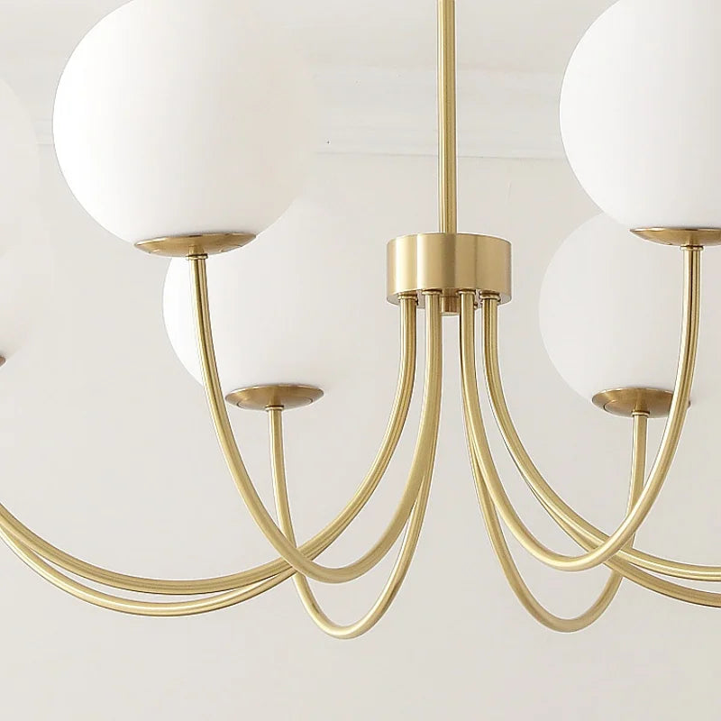 lustre moderne sphères translucides structure dorée blanc led salon chambre