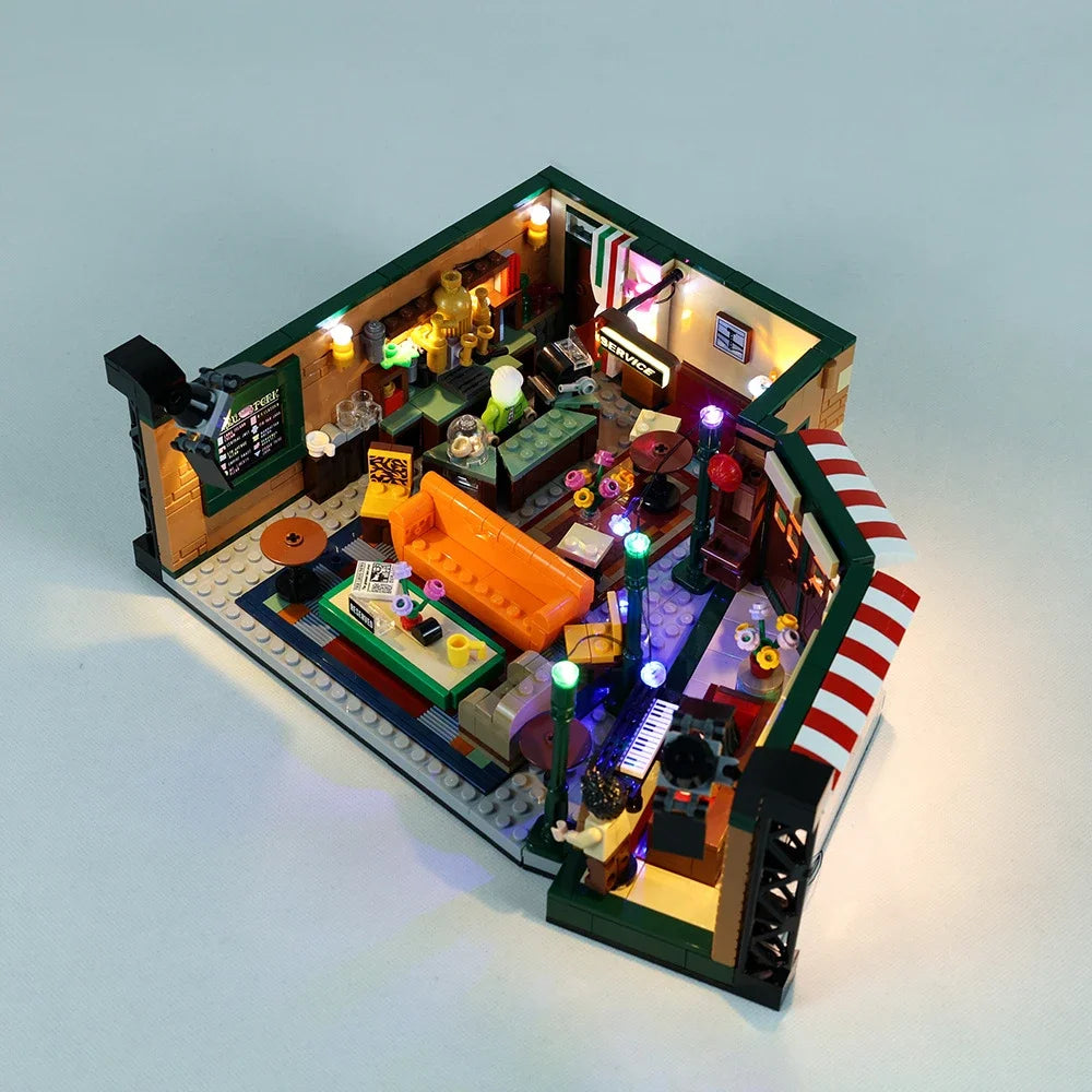 maquette lego détaillée adhésif lumineuse couleurs vives canapé bar étagères affiches