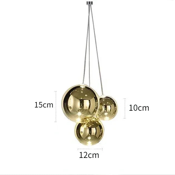 suspension lumineuse moderne sphères brillantes or argent transparentes chambre salle manger