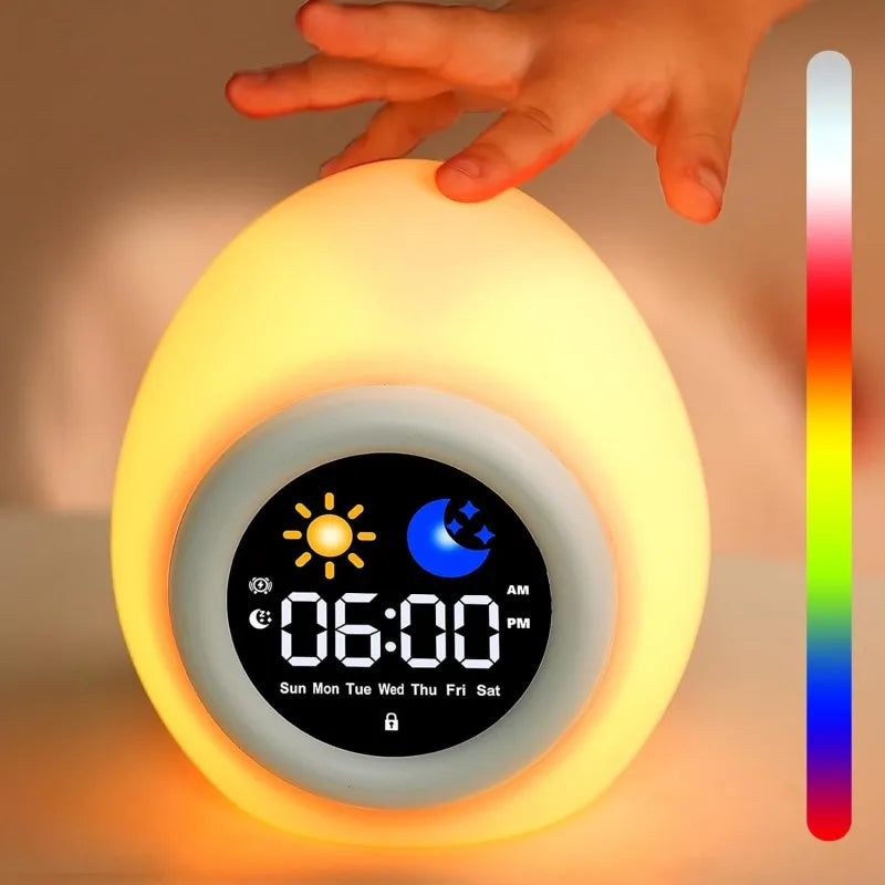lampe réveil enfant forme ovoïde écran led couleurs chaudes minimaliste sons apaisants veilleuse tactile
