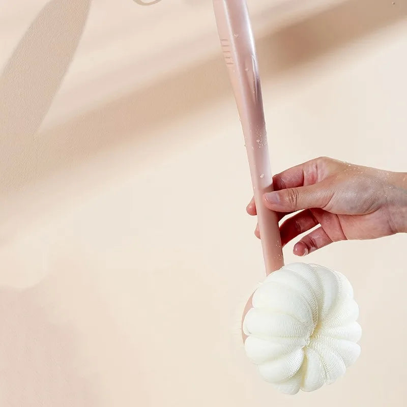 brosse bain douce flexible moderne poignée anneau blanc rose pâle texture maille corps nettoyage
