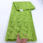 tissu dentelle coton blanc motifs floraux broderie strass robe couture luxe