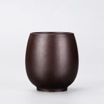 pot thé marron imprimé floral couvercle texte blanc classique traditionnel cordon boule bois épices
