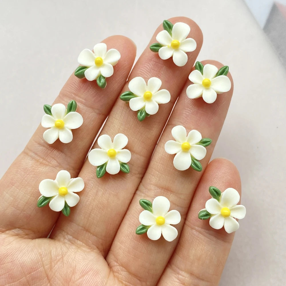 bijoux décoration ongles nail art fleurs colorées résine minimalistes blanc rose bleu vert jaune