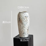vase poterie moderne gris beige fleur séchée décoration intérieure texture marbrée lisse rustique arrangement