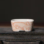 bol traditionnel décoré fruits pommes paysage motifs ondulés blanc orange bleu