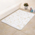 tapis bain sol antidérapant marbre doré duveté motifs veinés moderne