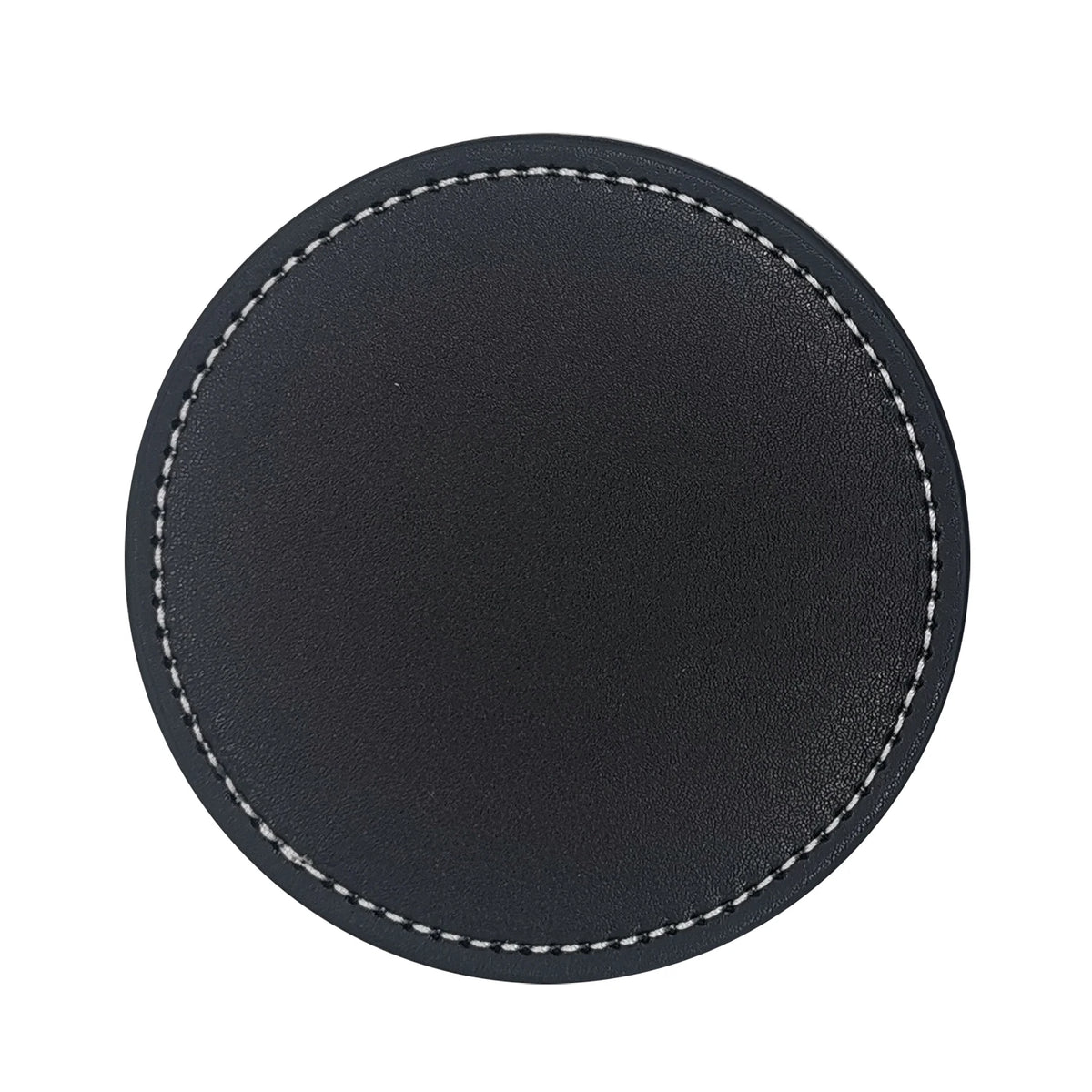 Disque en cuir noir avec une finition lisse et des surpiqûres blanches, convenant à une utilisation décorative ou fonctionnelle.