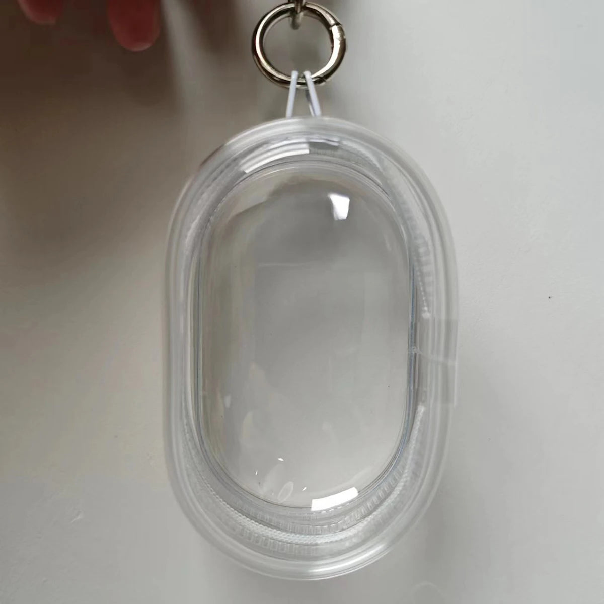 coque protection transparente moderne minimaliste anneaux métalliques boucles portes clés écouteurs sans fil rose