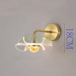 lampe murale moderne élégante fleur dorée pétales transparents éclairage cuisine salle manger
