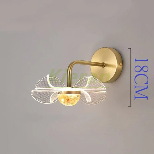 lampe murale moderne élégante fleur dorée pétales transparents éclairage cuisine salle manger