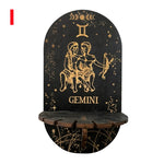 étagère murale noire dorée ornementations astrologiques pendeloques semi précieuses artisanal