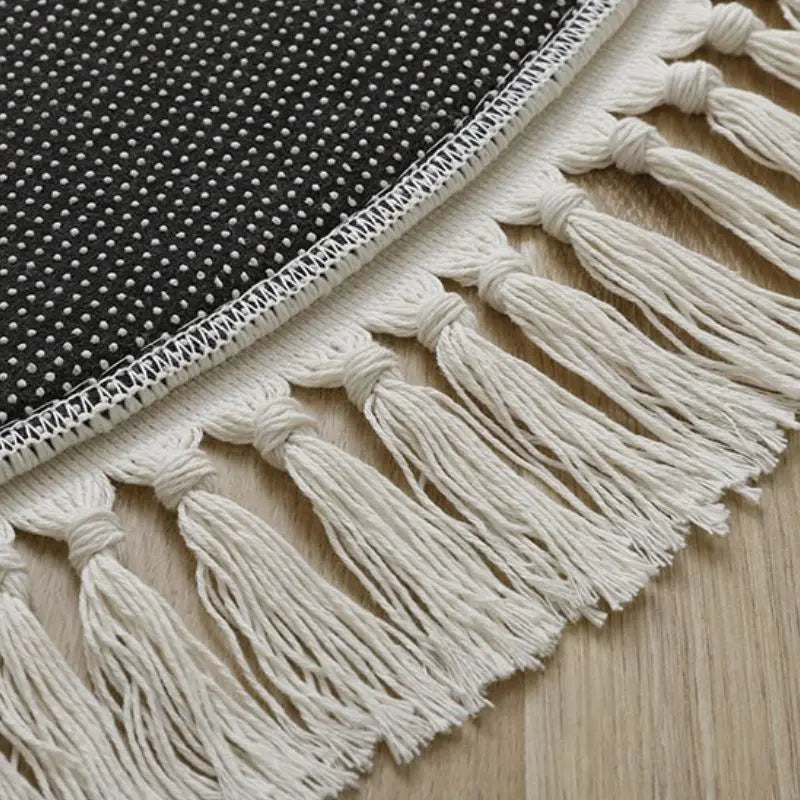 tapis rond moderne vert clair texture douce franges blanches salon chambre bébé