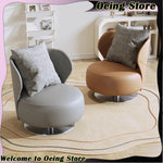 fauteuil moderne cuir lisse coussin rotation métal salon maison minimaliste