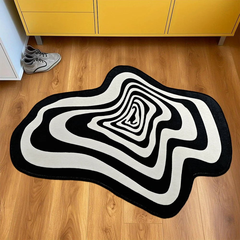 tapis noir blanc moderne abstrait rayures concentriques effet ondulé salon intérieur