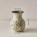 vases céramique vintage fleurs classiques blanc vert beige bruns intérieur salon bibliothèque