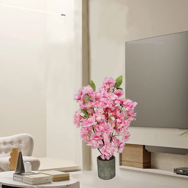 décoration intérieure plante artificielle fleurs feuilles moderne rose blanche verte salon