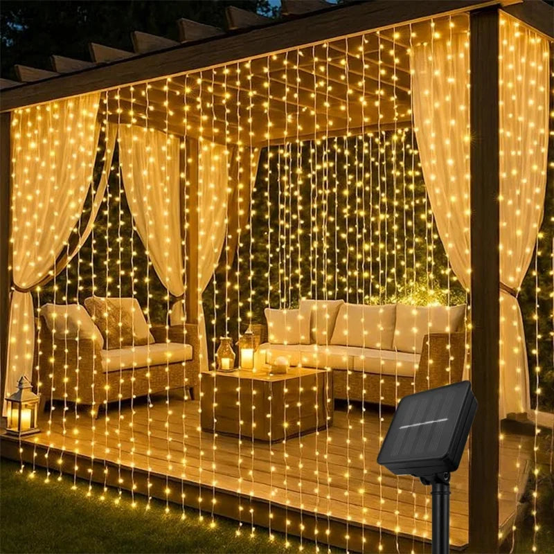 guirlande lumineuse rideau cascade jaune blanc extérieur solaire festif decoration pergolaextérieurchaleureux