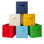 boîtes rangement pliables tissu uni moderne bleu marine beige jaune vert poignées détachables respectueux