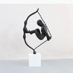 Sculpture moderne tête tête noir blanc socle pierre bouteille diffuseur livresscrição